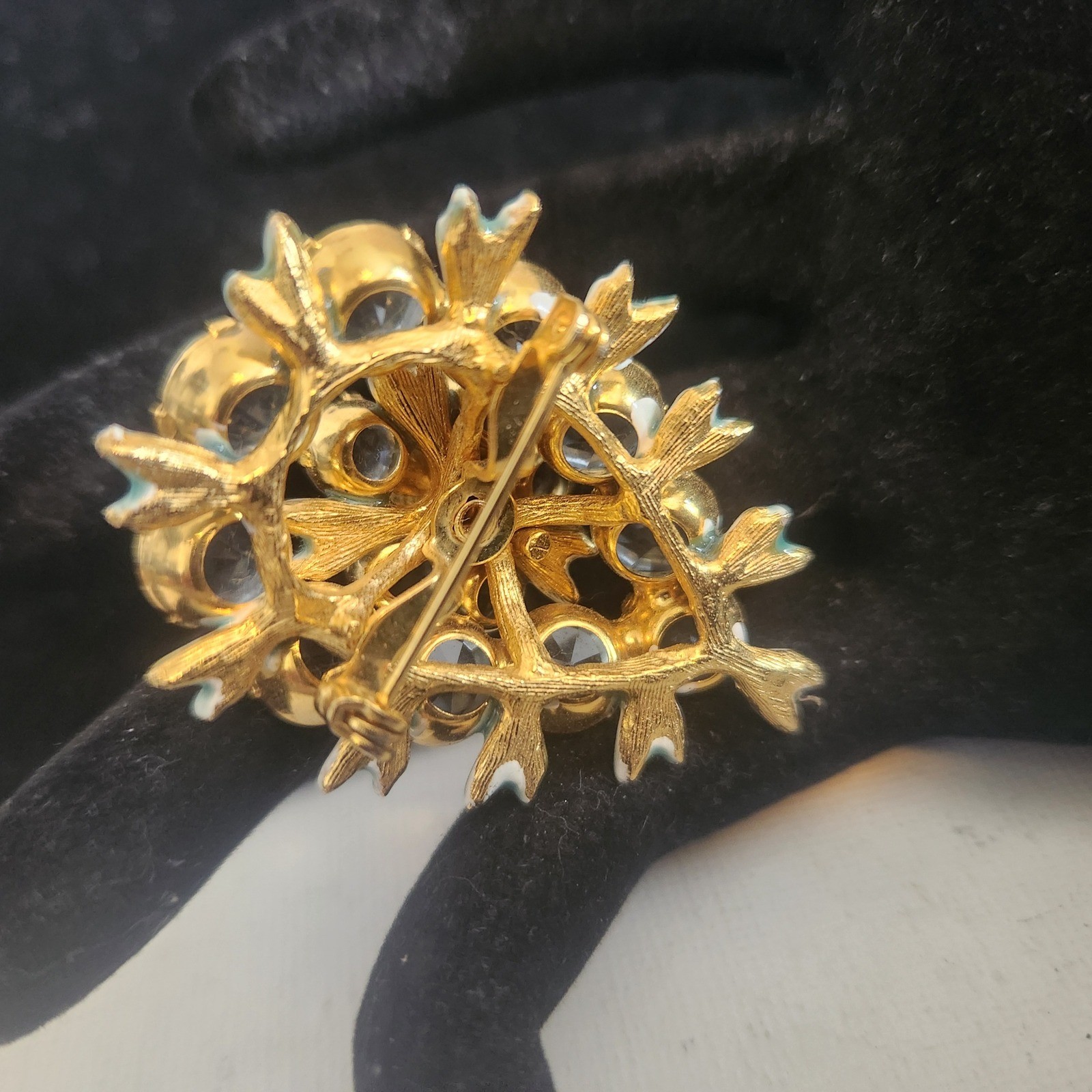 Vintage Light Blue Rhinestone Floral Cluster brooch Gold Tone Enamel Leaf Detail