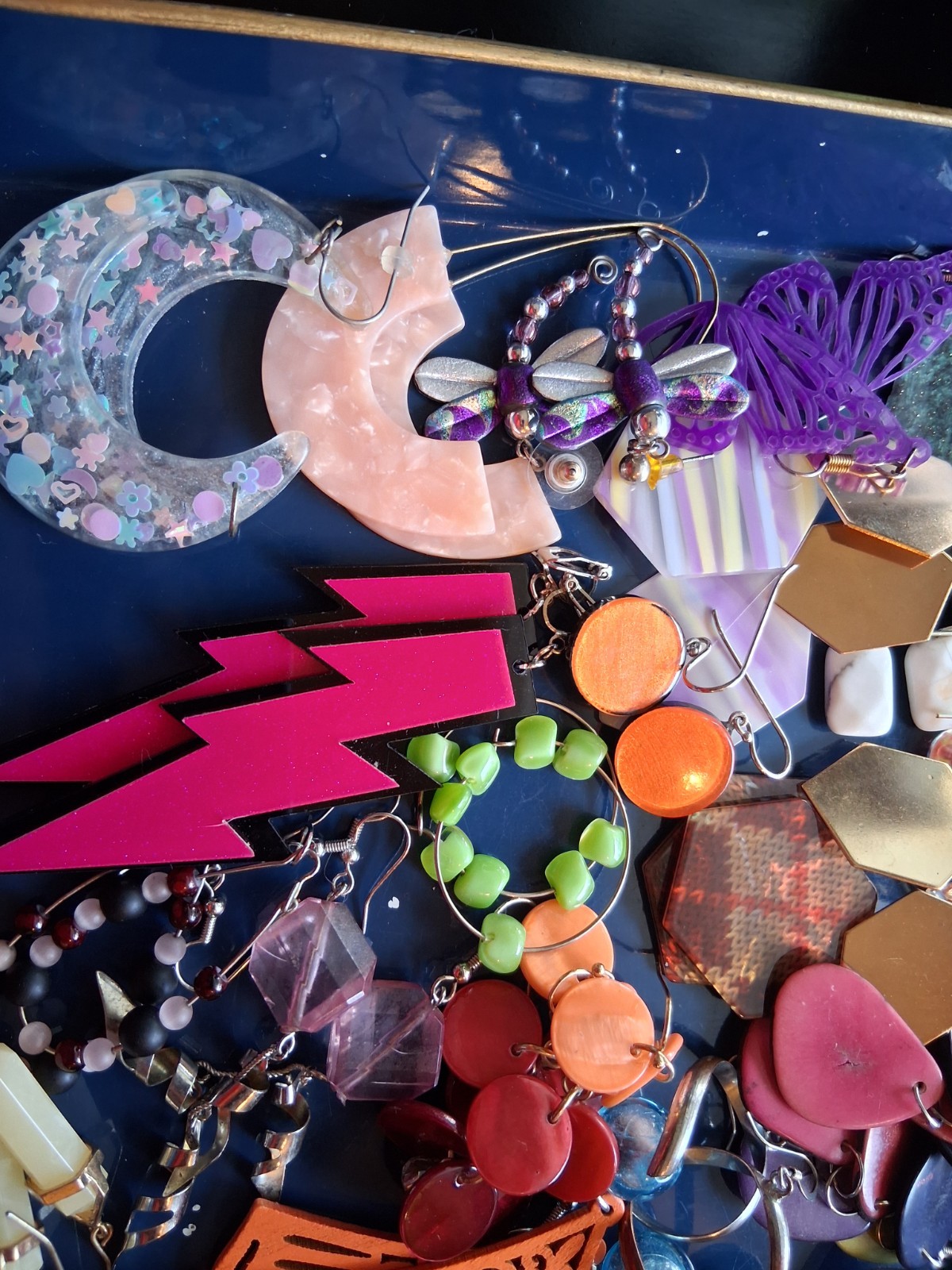 30 + Colorful Glitter Lucite, Acrylics, painted metals, and wood relief earring