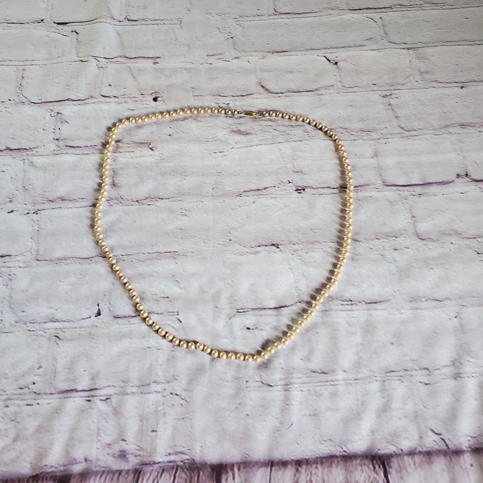Vintage glass pearl necklace with sterling vermeil filigree clasp and hand knot