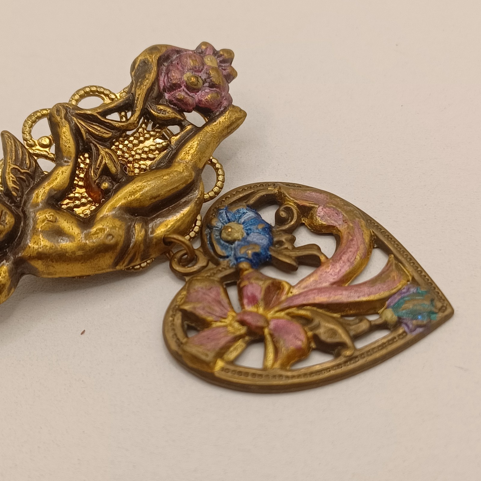 Brass Cherub with Heart Dangle Purple and Blue Enamel flowers and bow Pin Brooch