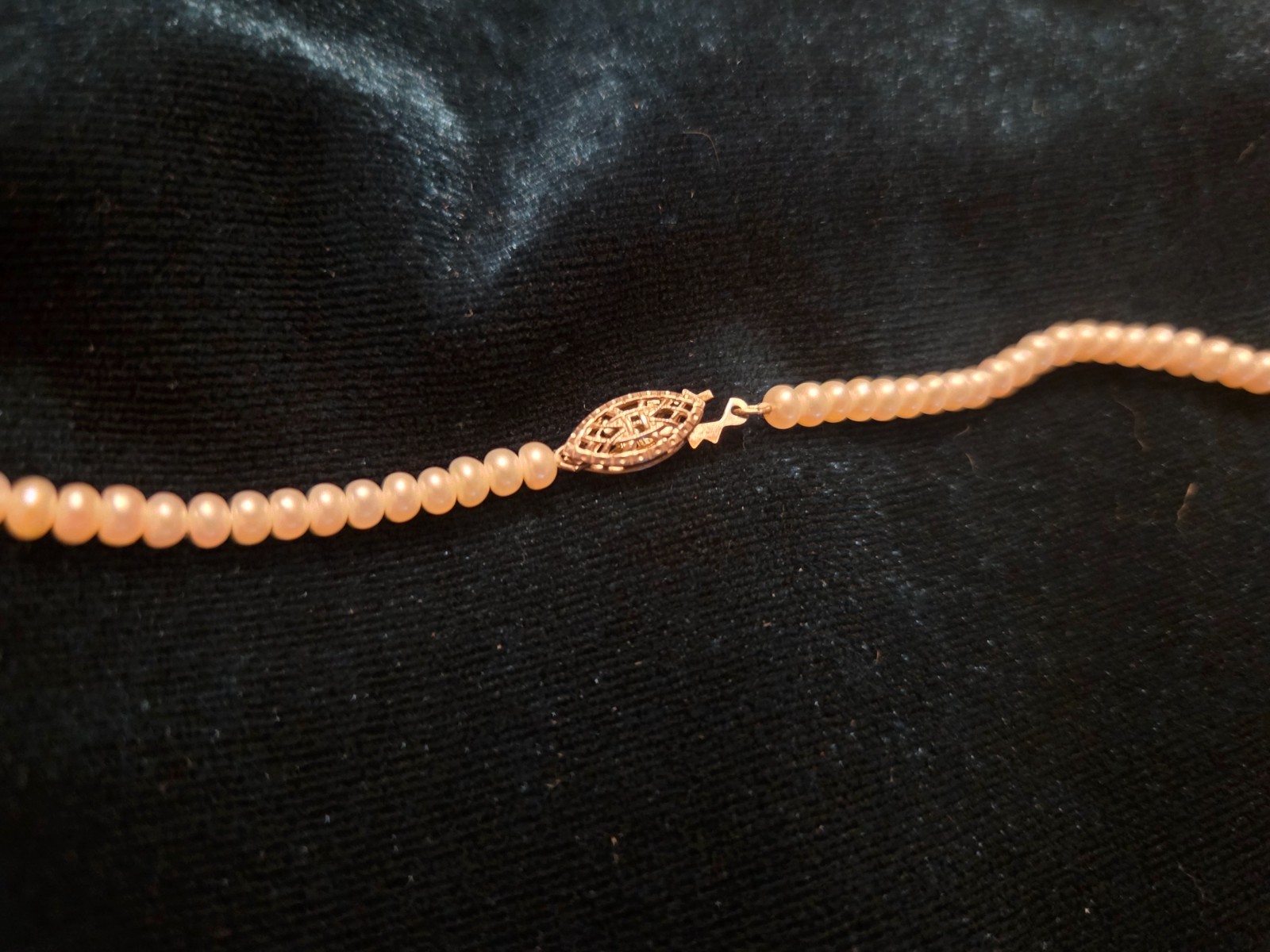 Vintage graduated natural pearl necklace with fish hook clasp