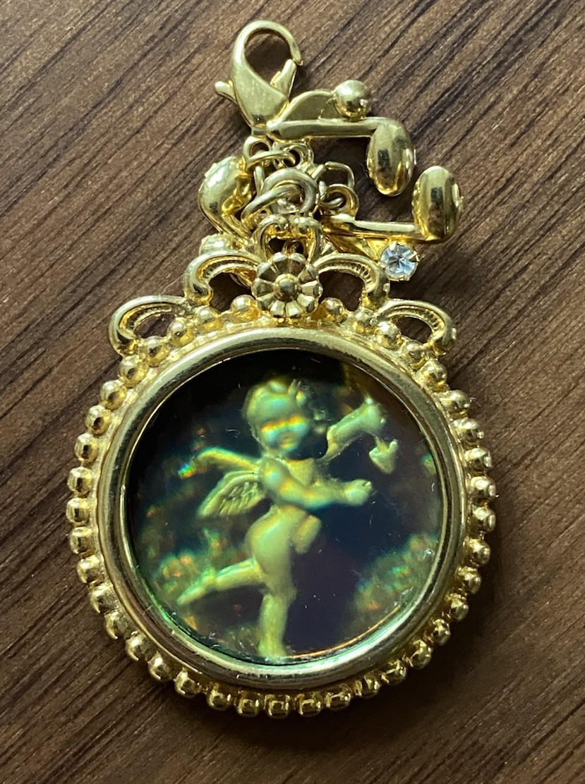 Vtg. Kirks Folly Symphony of Angels Cherub Lenticular Hologram Charm Pendant