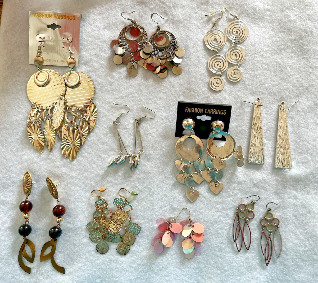 Lot of 10 pair of silver and gold tone dangle pierced earrings