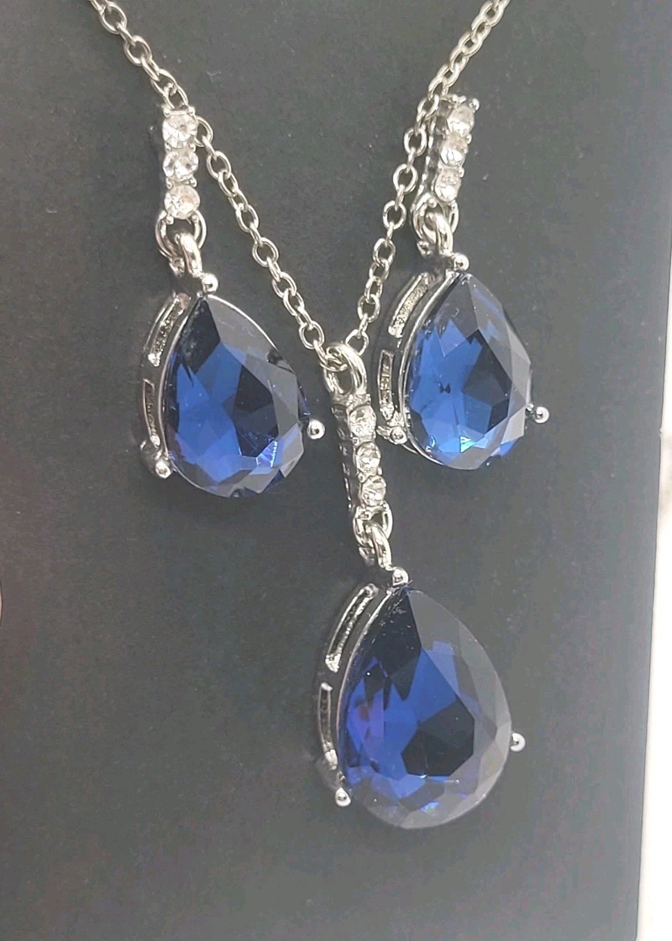Silver Tone Blue Crystal Chain Rhinestone Necklace 18in And Dangling Earrings.