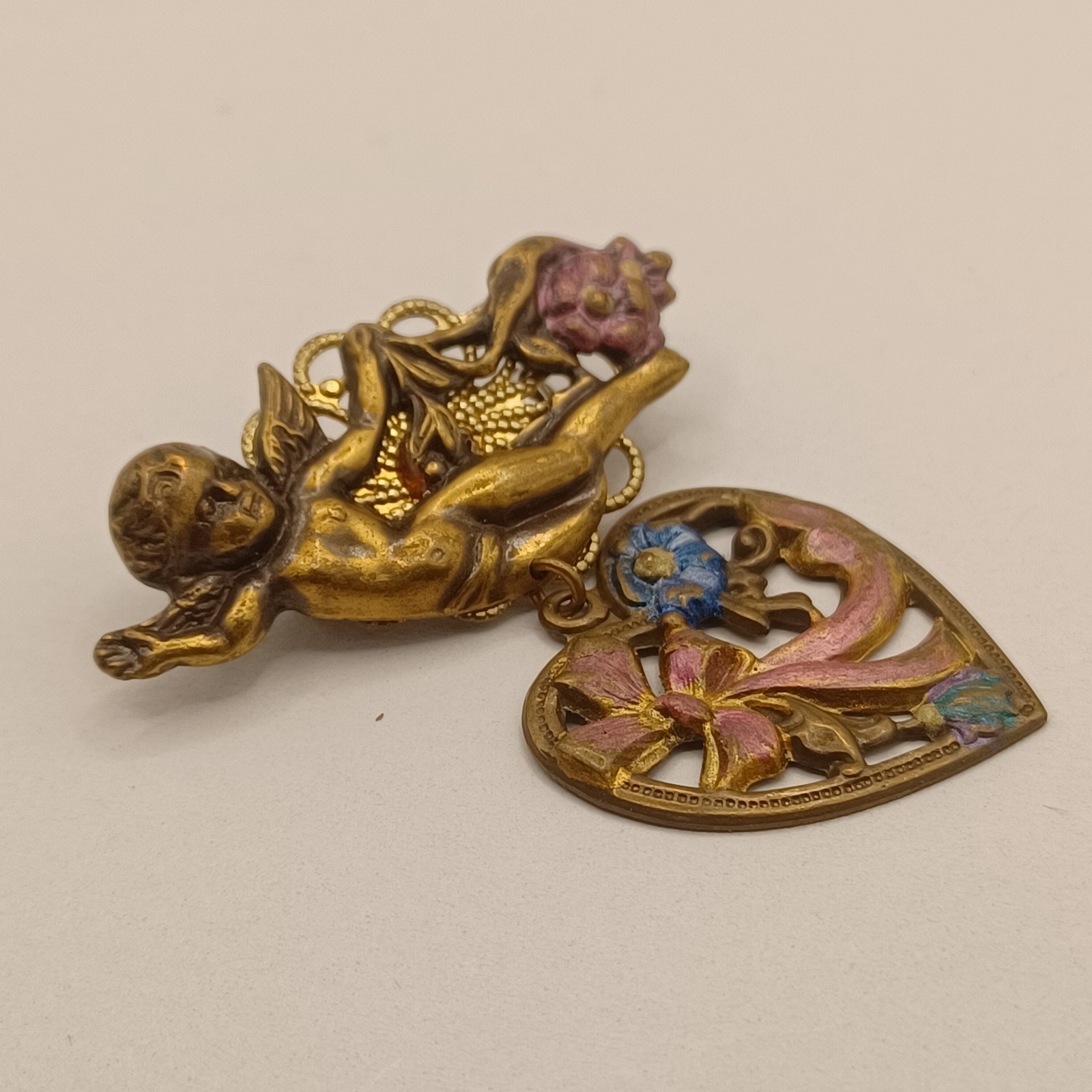 Brass Cherub with Heart Dangle Purple and Blue Enamel flowers and bow Pin Brooch