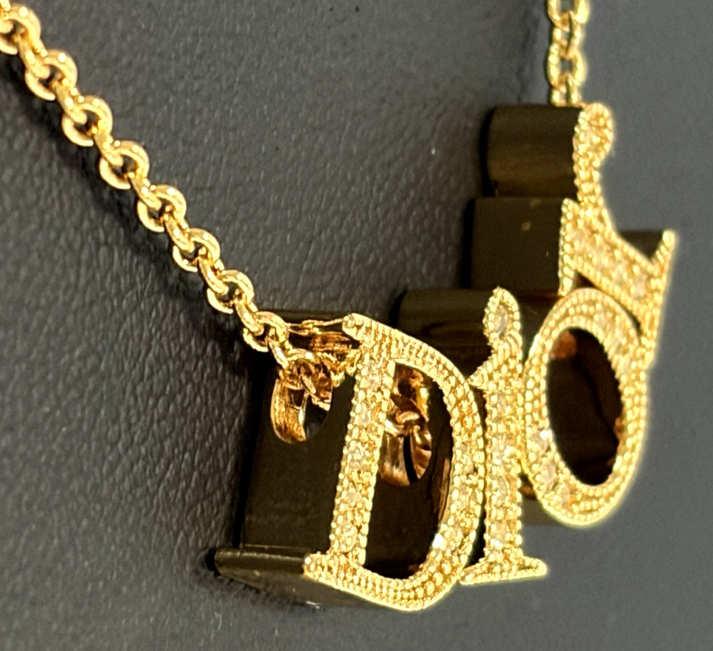 Christian Dior necklace pendant Features the DIOR logo rhinestones gold plating
