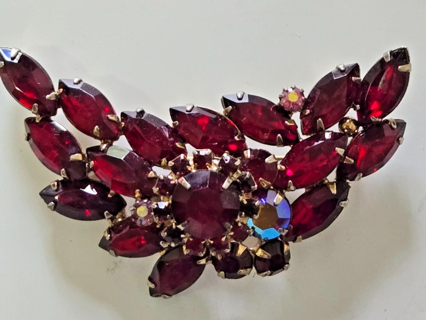 Vintage Brooch. Goldtone with Dark Red Stones. Pink Accent Stones. Gorgeous.