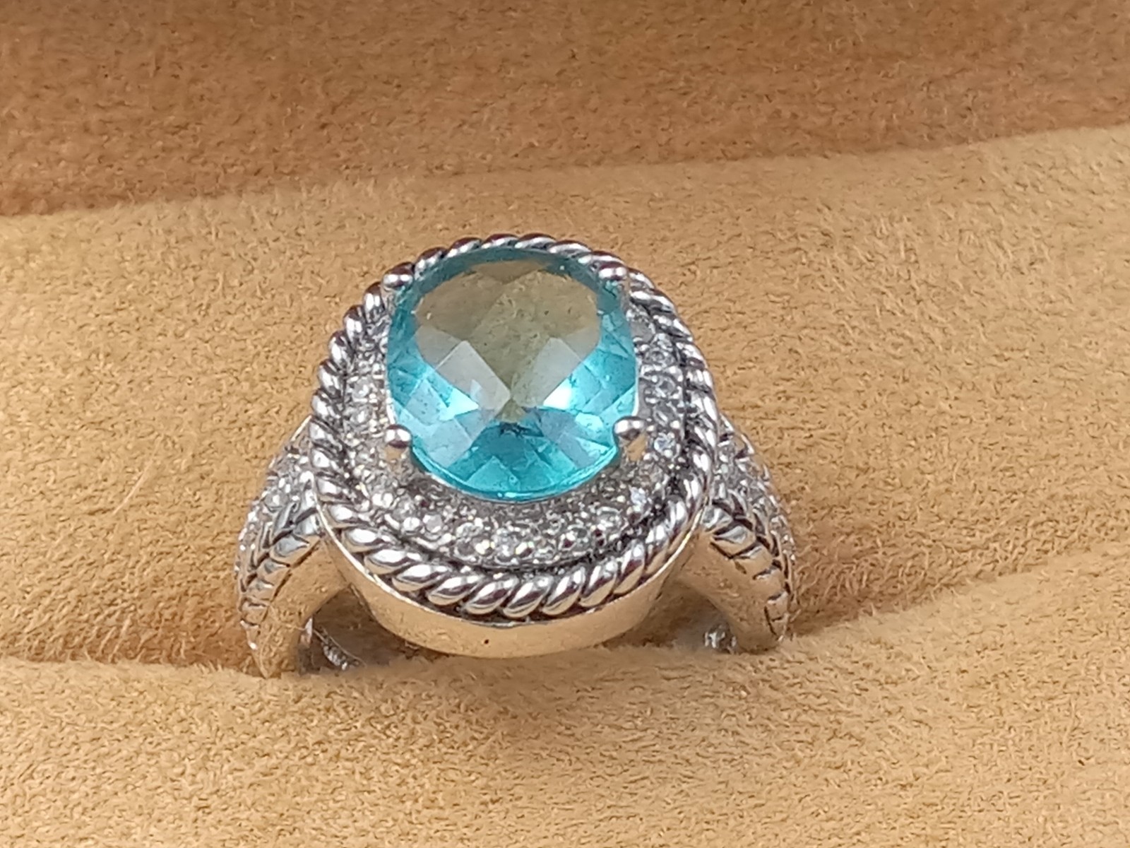 Sterling Silver Ring w. Blue Topaz Oval Center Stone & Clear Trim Stones: Size 6