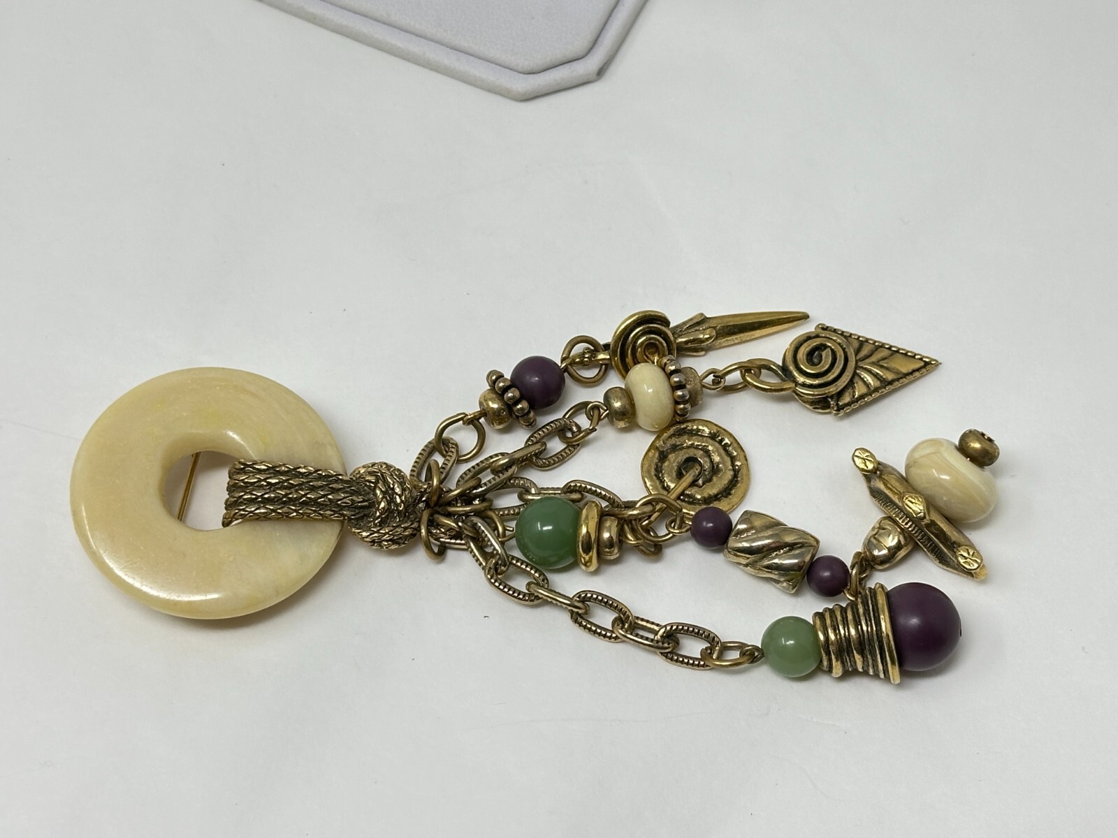 1928 Brand Goldtone Purple Cream Green Bead 5.75″ Long Fringe Brooch Pin