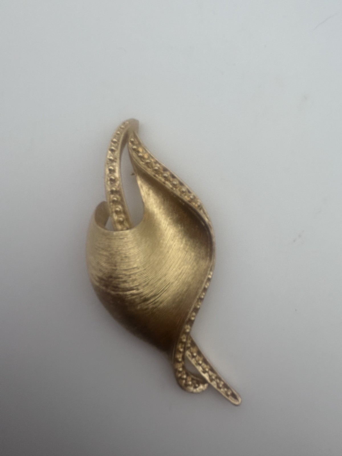 Vintage Wave-Shaped Ribbon Monet Brooch Brushed Gold Tone