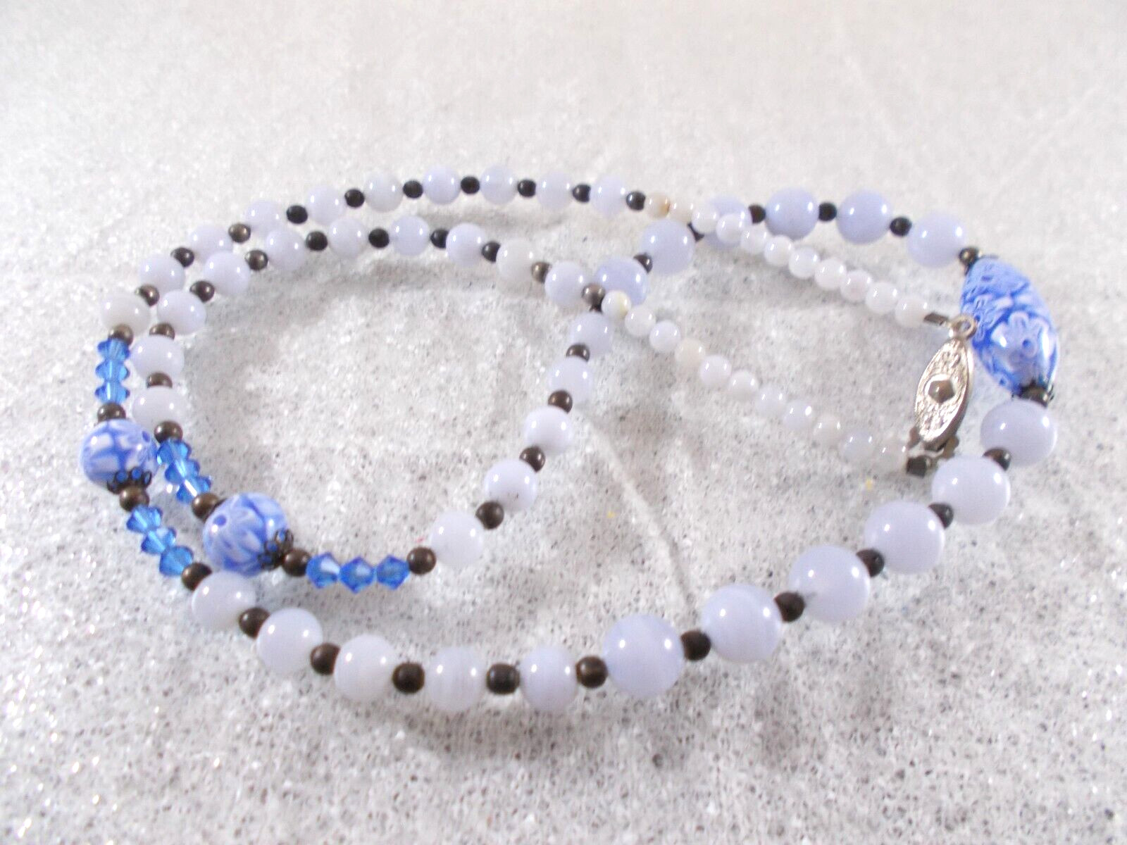 Graduated Blue Glass Bead Necklace with Millefiori Bead Accents Fish Hook Clasp