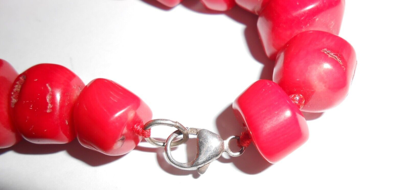 GENUINE UNDYED RED CORAL BEADS NECKLACE WITH STERLING CLASP.