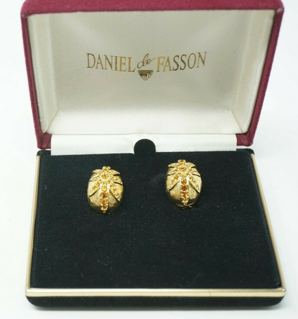 Daniel de Fasson Yellow Rhinestone Gold Tone Earrings Clip On Star Sunburst