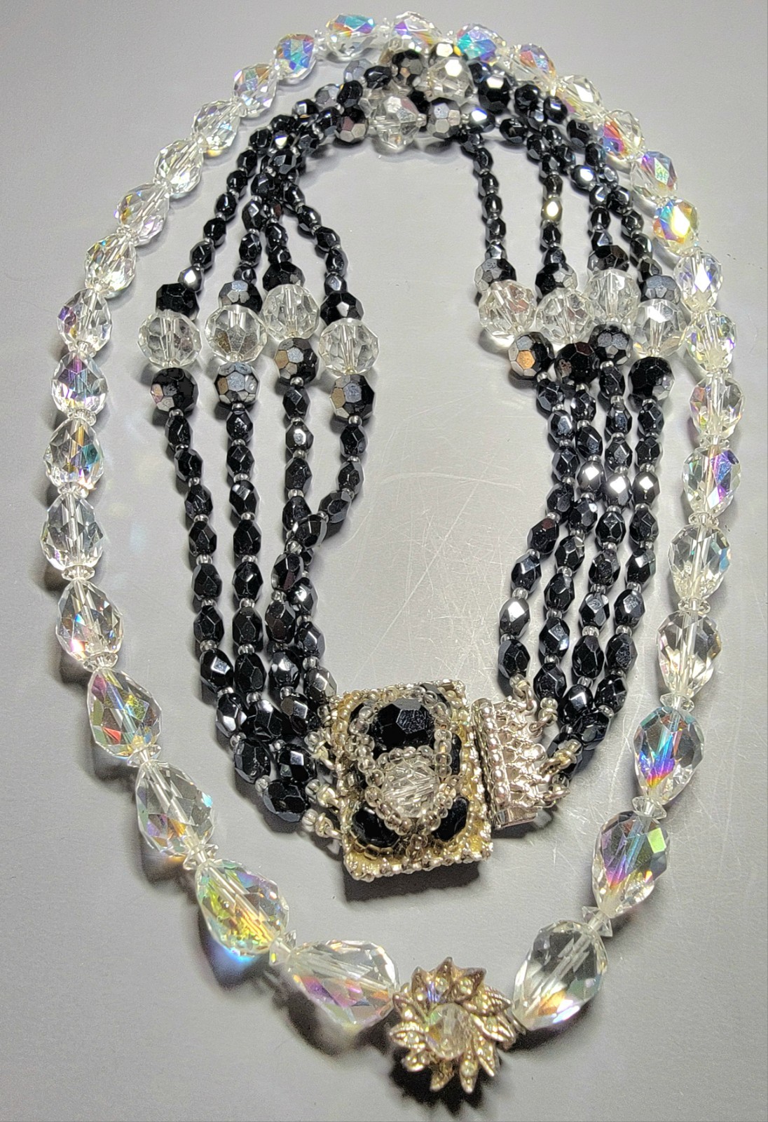 Sandor 4 Strand Black Crystal Signed Beaded And AB Clear Faceted Oval Necklaces