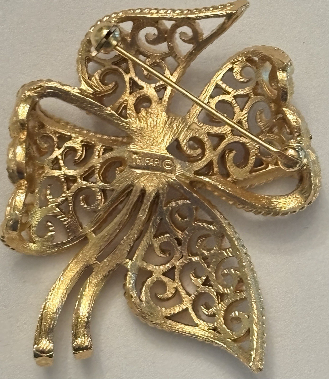 Vintage Crown Tifari Signed Gold Tone Filigree Bow Brooch Openwork Ribbon Bow