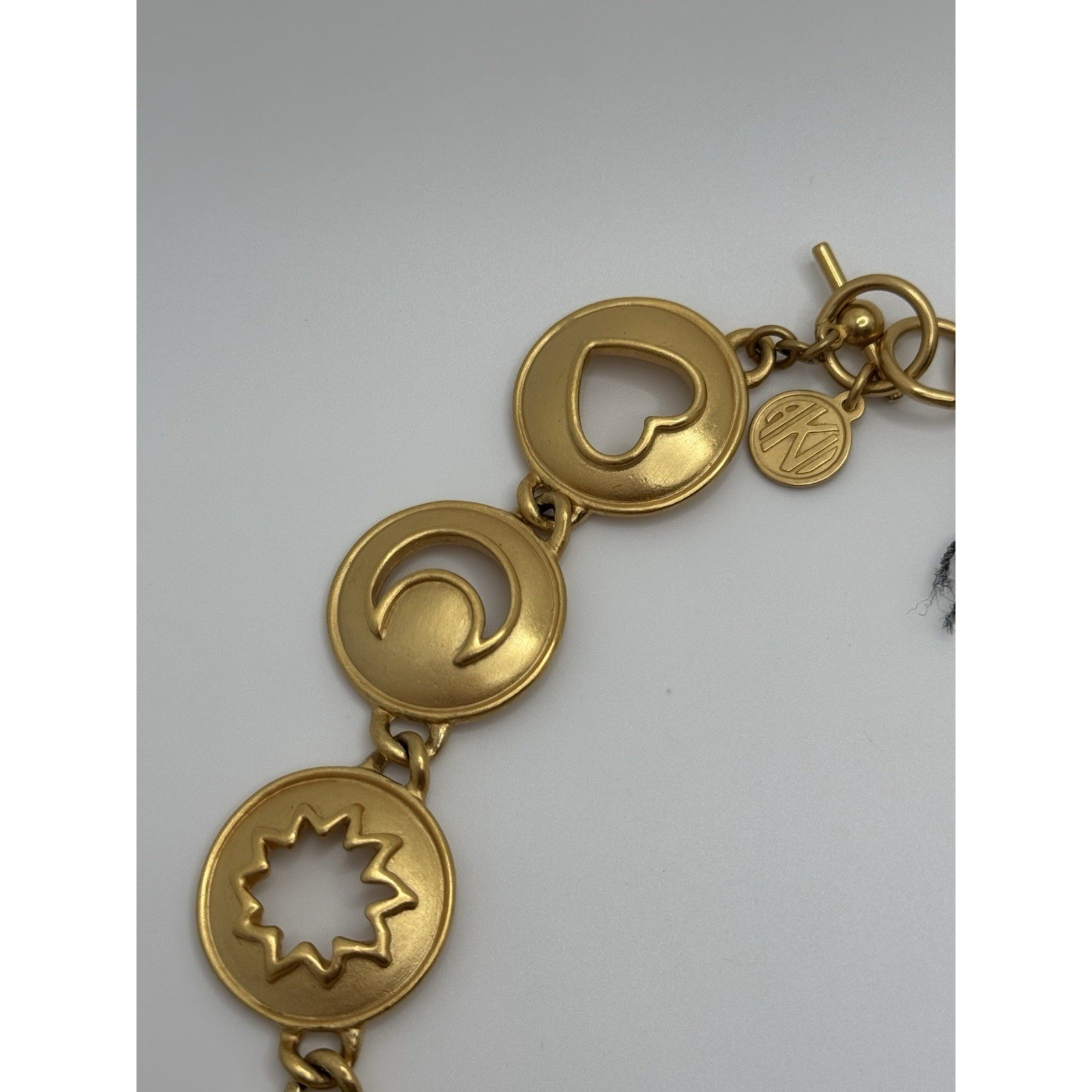 Vintage Anne Klein Necklace Matte Gold Tone Heart Star Moon Cut Out Round Link