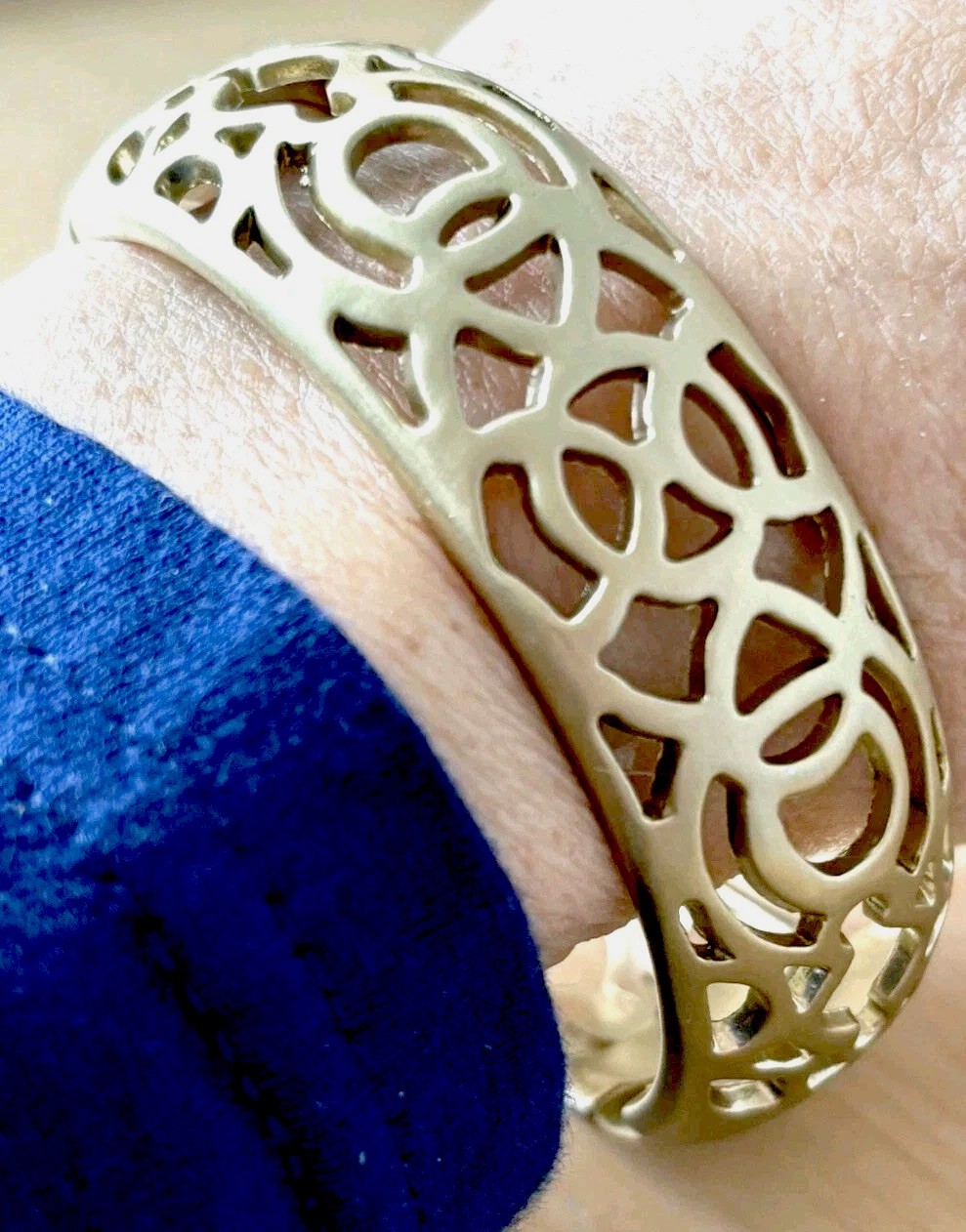 Open filigree hinge bracelet/ brushed antique gold tone/ size 6.75