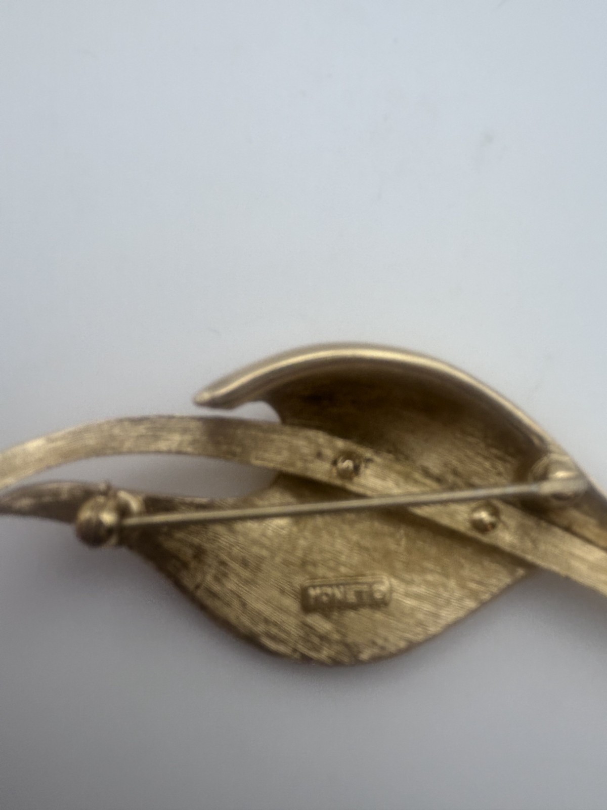 Vintage Wave-Shaped Ribbon Monet Brooch Brushed Gold Tone