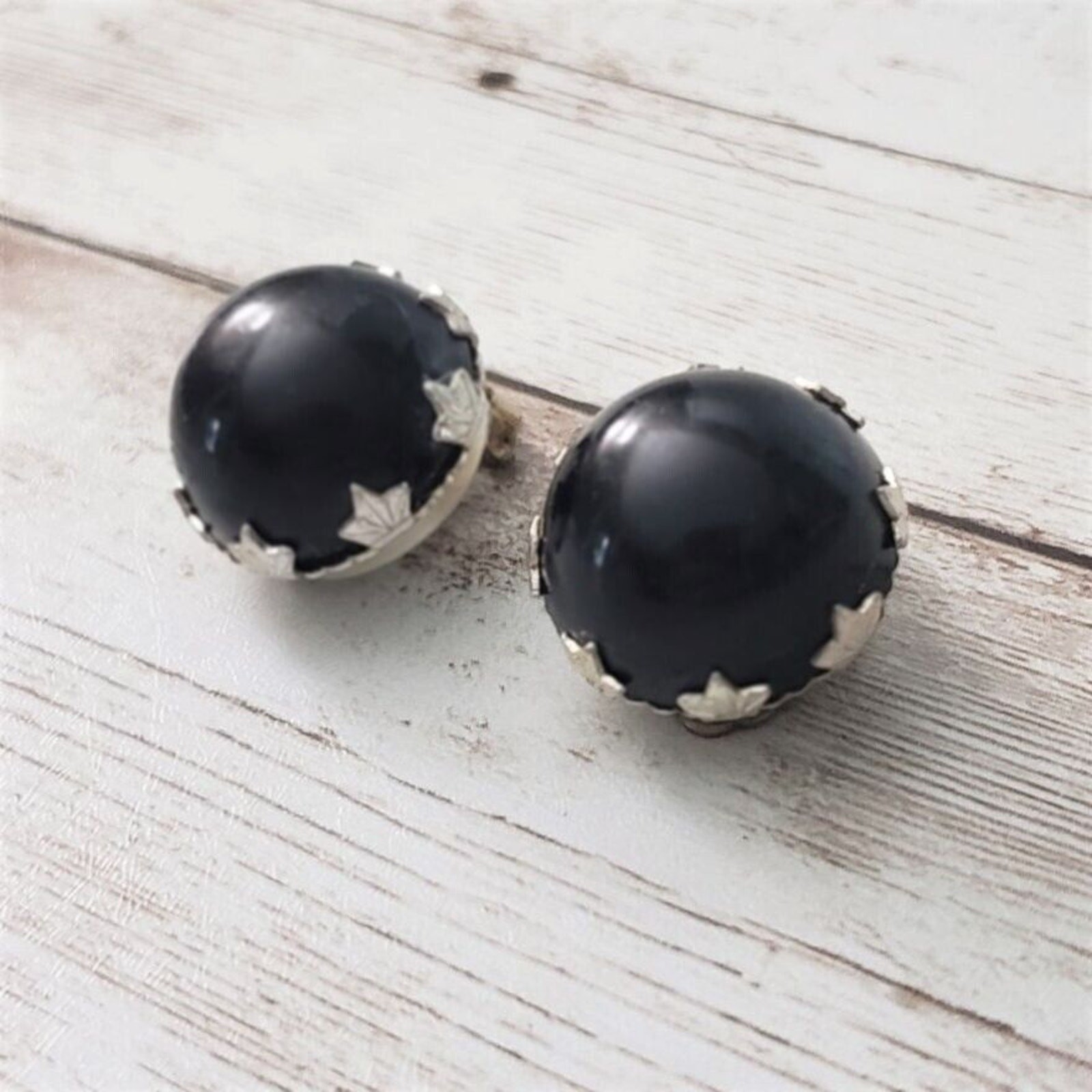 Vintage Clip On Earrings Black Domed with Silver Tone Leaves Detail 0.75″