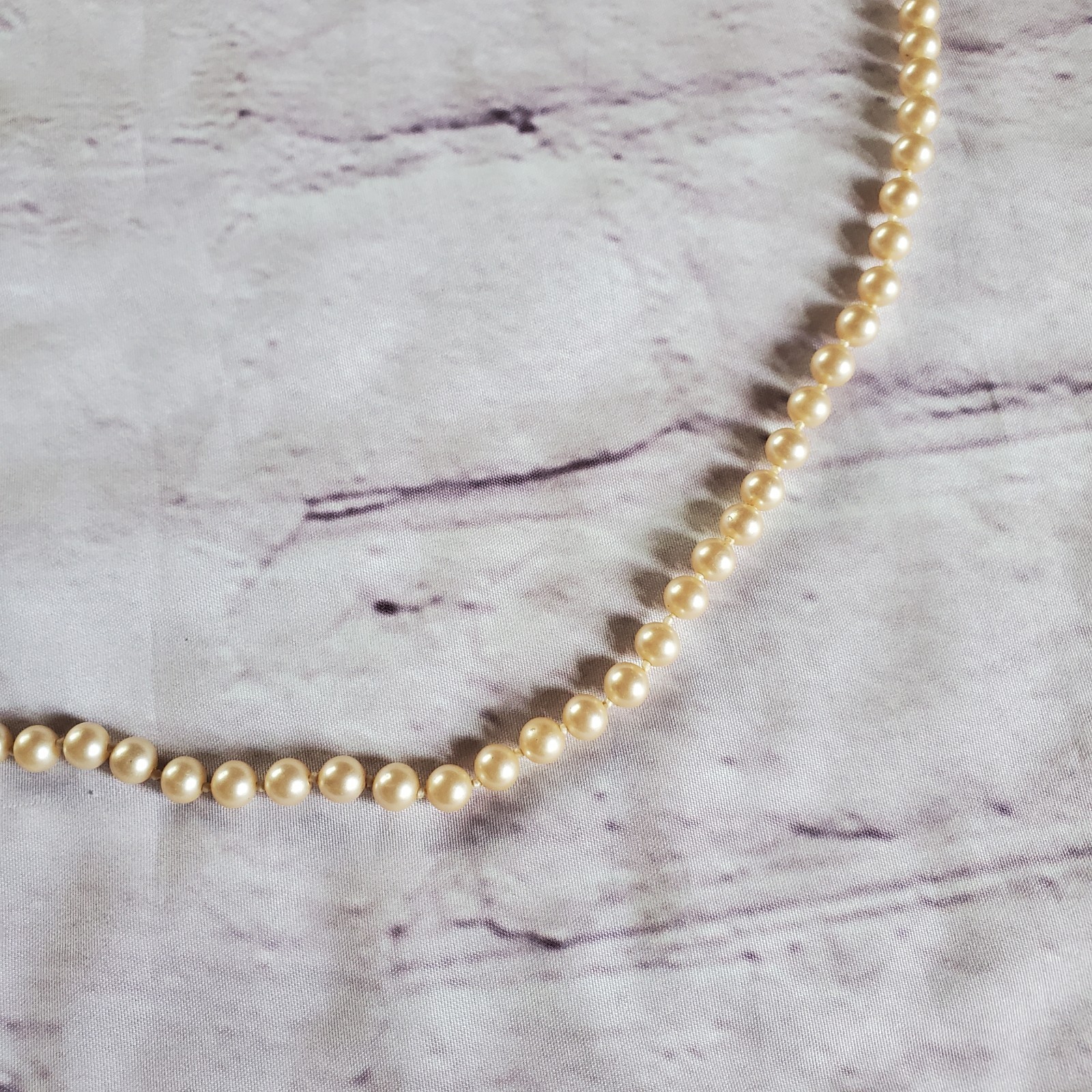 Vintage glass pearl necklace with sterling vermeil filigree clasp and hand knot