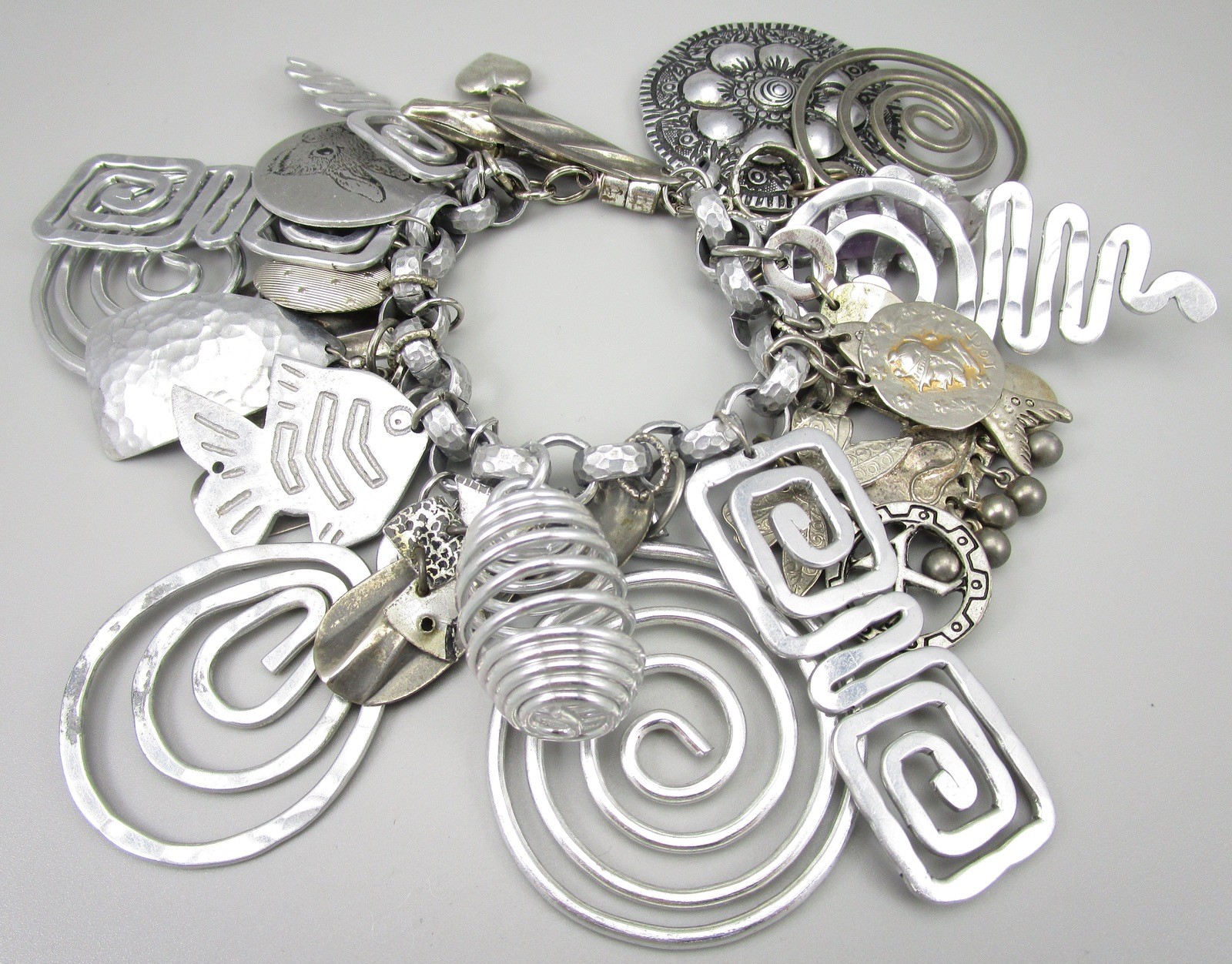 AMAZING 1980’S OVERSIZED ALUMINUM MIXED METAL CHUNKY CHARM BRACELET
