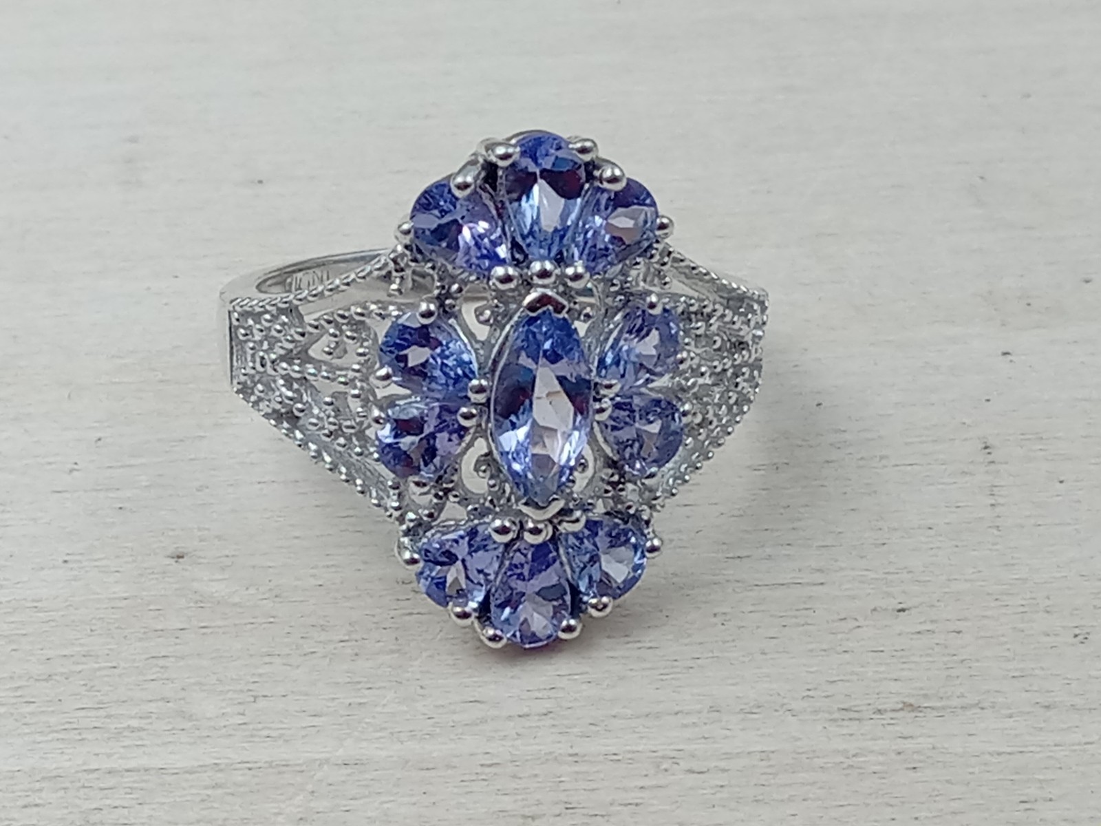 Sterling Silver Size 8 Ring w. Intricate multiple Iolite Gemstones Setting