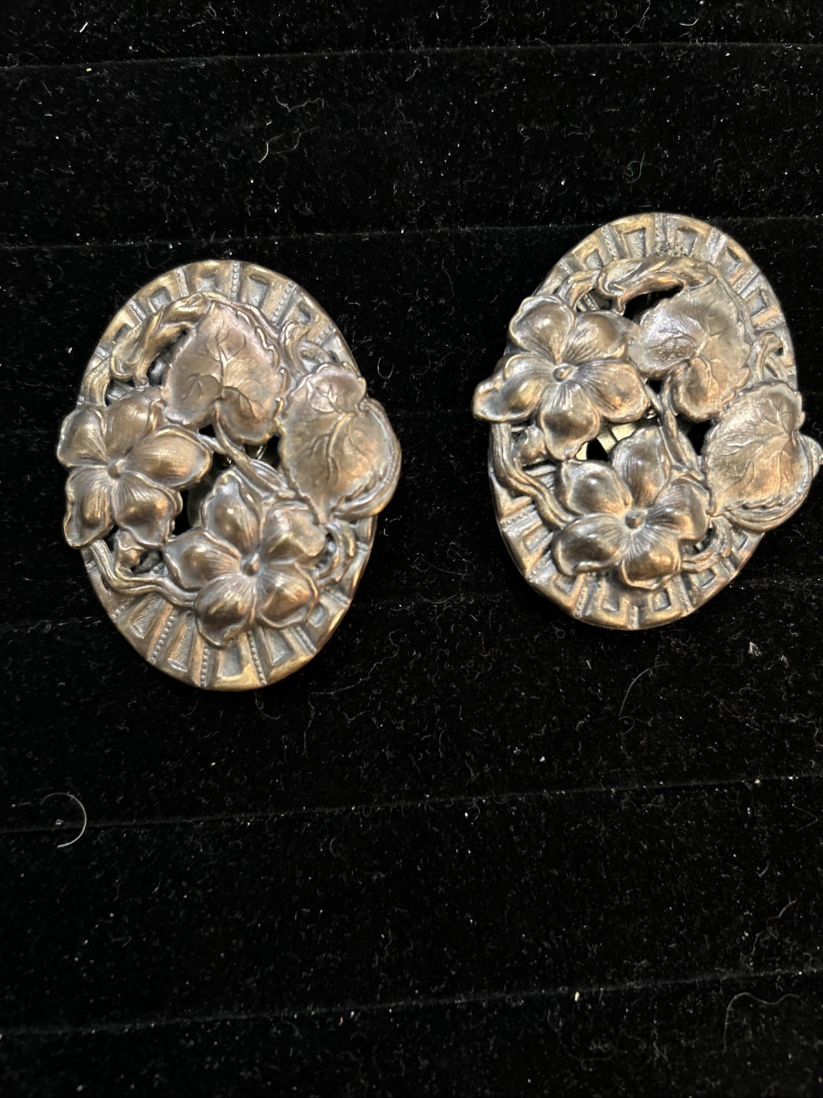 Pair of Vintage Floral Repousse Brooches