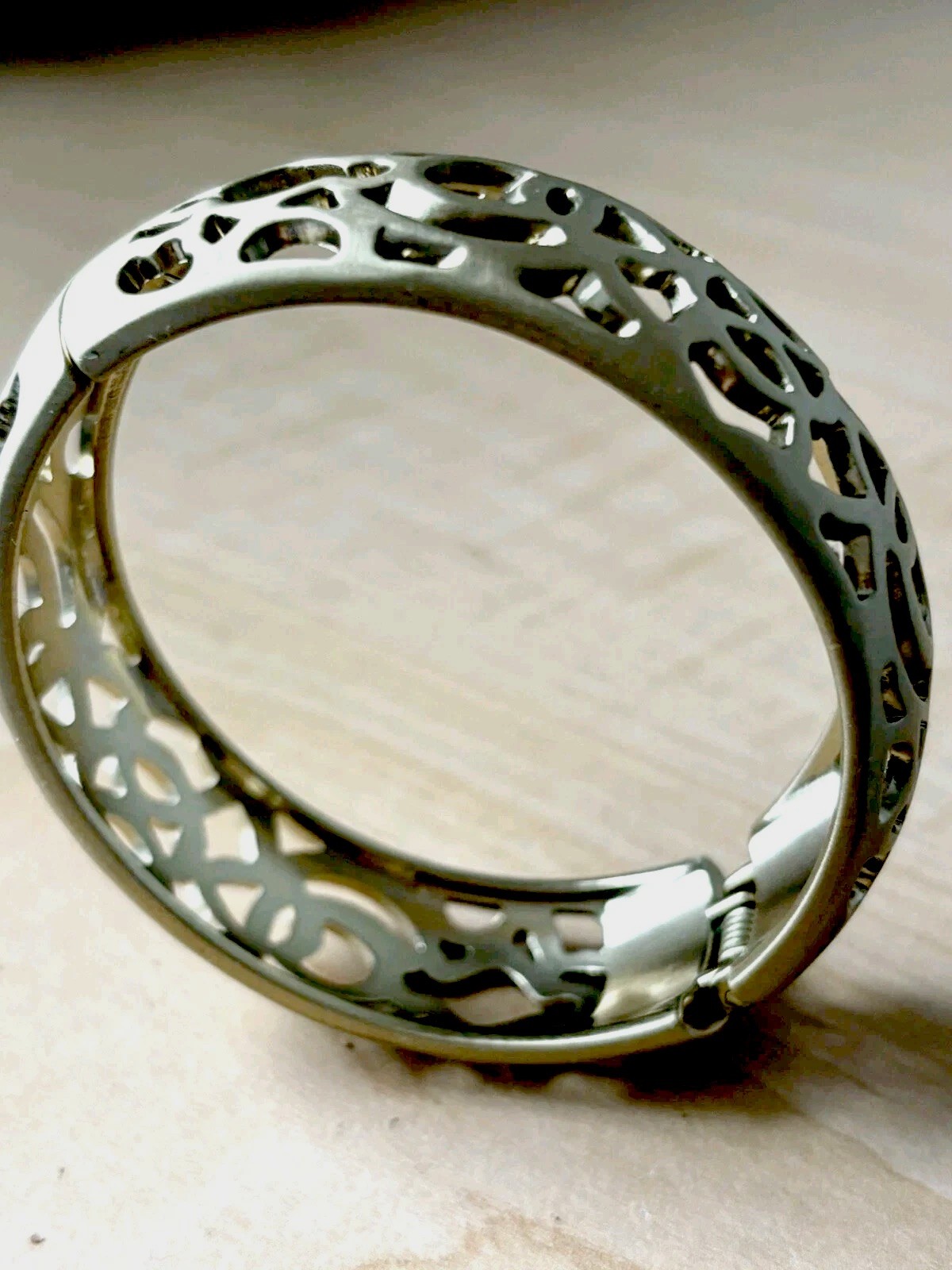 Open filigree hinge bracelet/ brushed antique gold tone/ size 6.75