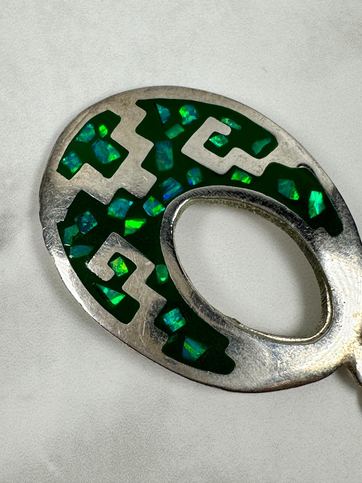 Sterling Silver Green Opal Chip Inlay Oval Cut Out Pendant – 1 1/2″ Long