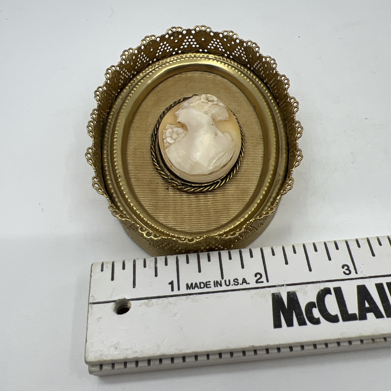 Vintage Oval Shell Cameo Portrait in Brass Ornate Filigree Frame Beige White