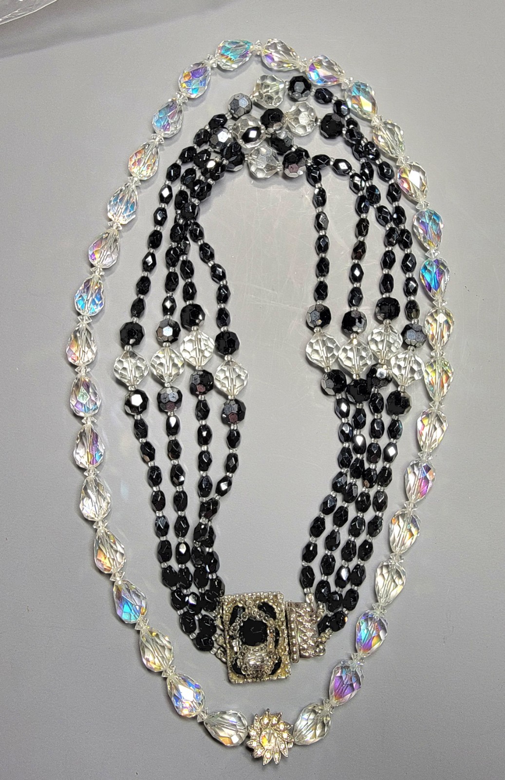 Sandor 4 Strand Black Crystal Signed Beaded And AB Clear Faceted Oval Necklaces