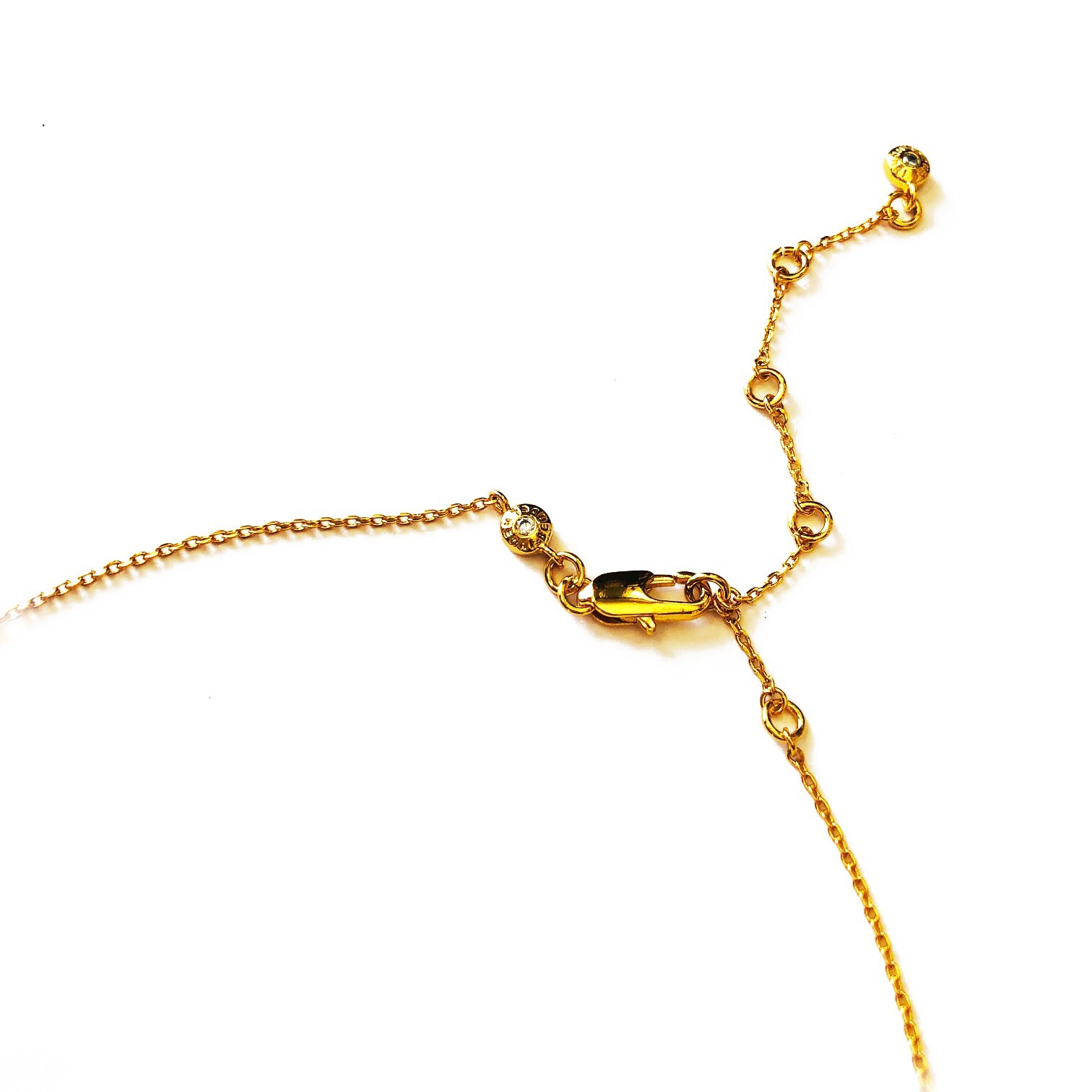 AUTH NEW Henri Bendel GOLD Shark’s Tooth CZ Crystal Charm wtag and Dust Bag RARE