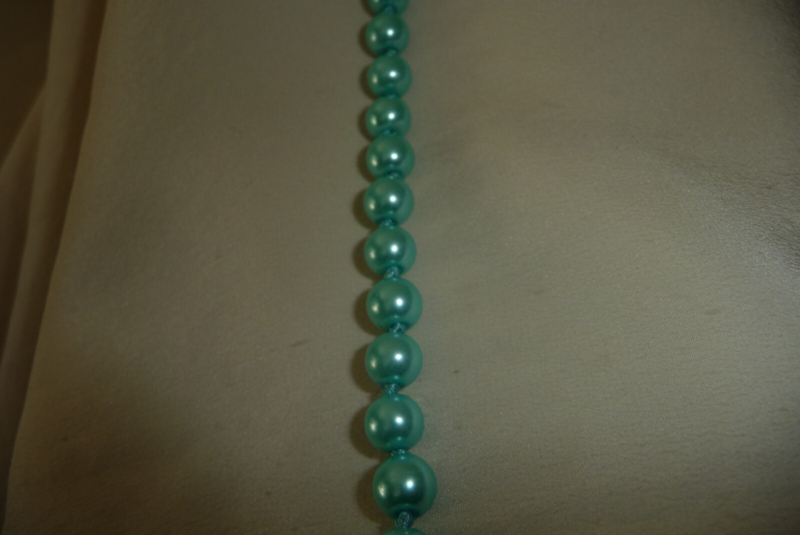 #1721A NECKLACE 28″L NO CLASP HAND KNOTTED AQUA BLUE FAUX PEARL BEADS