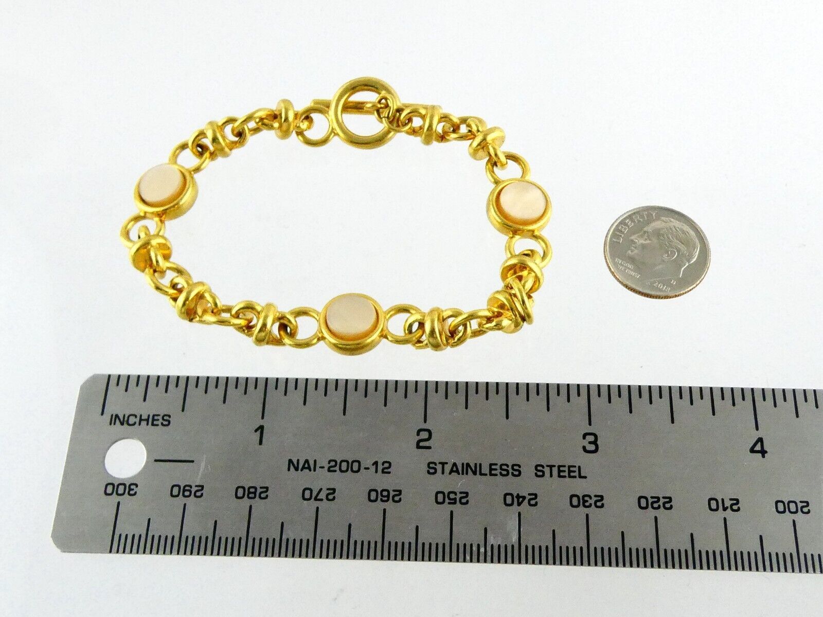 Monet Goldtone Metal and Mother of Pearl Shell Link Bracelet Toggle Clasp 7 Inch