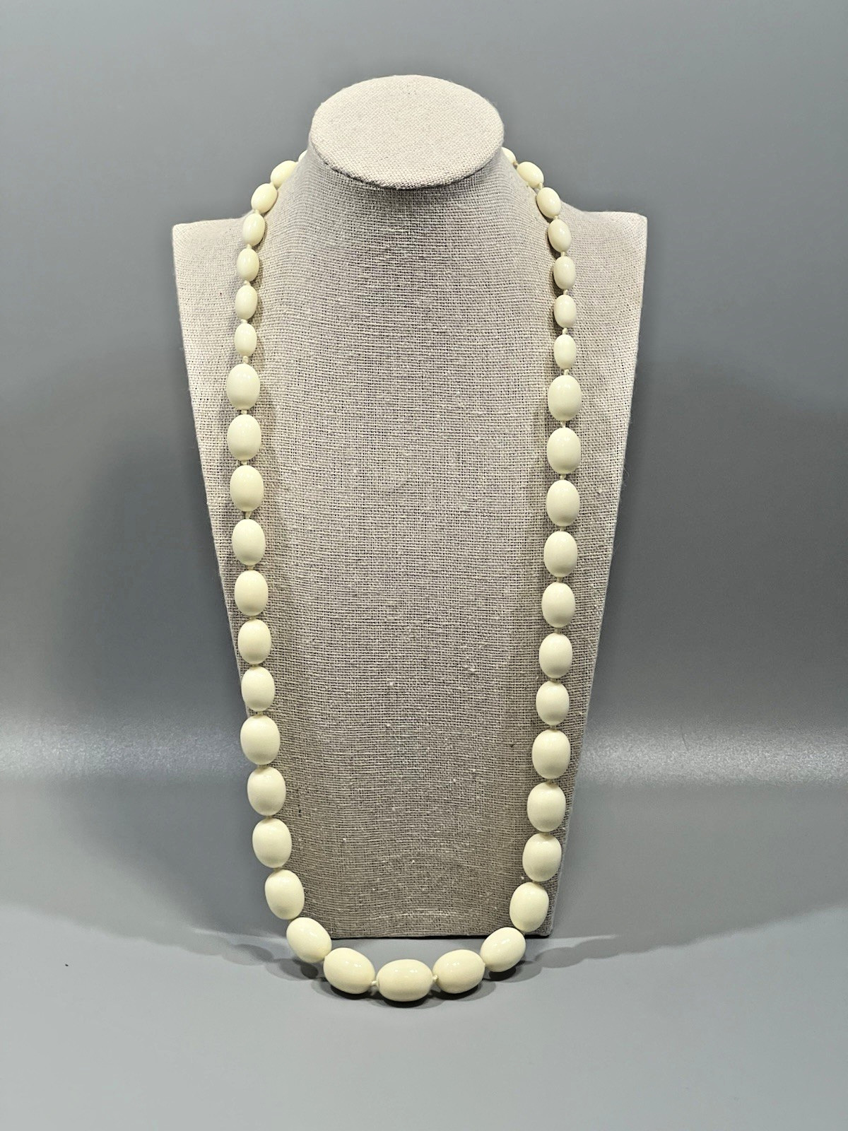 VTG 1960s Trifari Graduated Off White Ivory Oval Beads Knotted Necklace 30″ Long