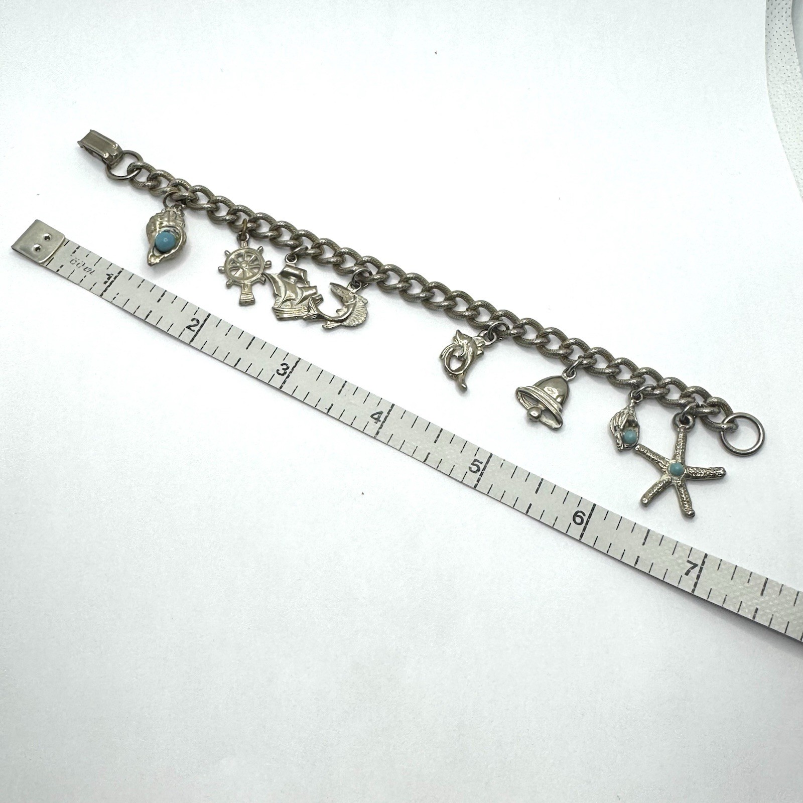 Vtg Charm Bracelet Starfish Ship Conch Shell Faux Turquoise Charms Curb Chain 7″