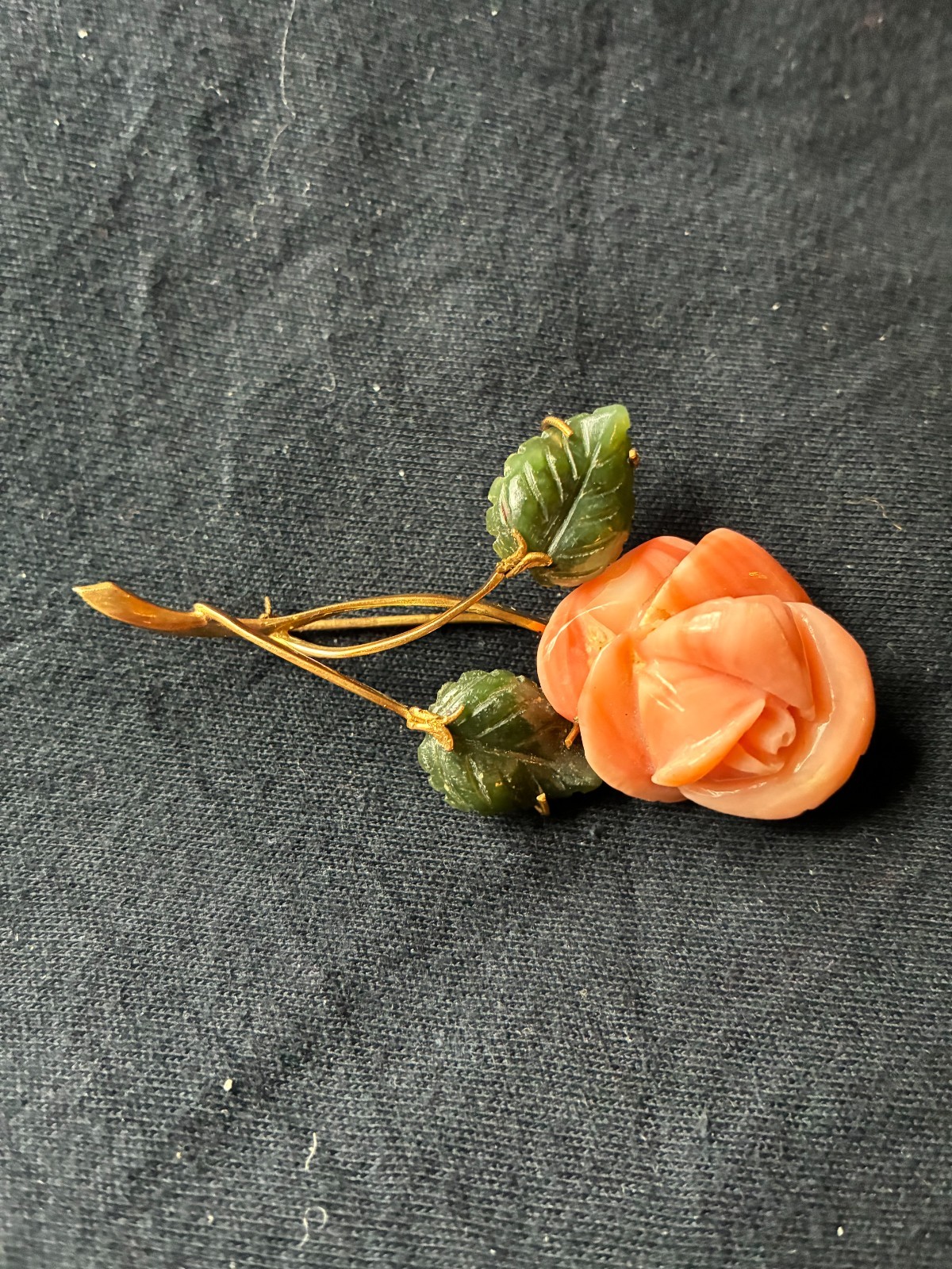 Charming rose-shaped coral pin with enamel leaves