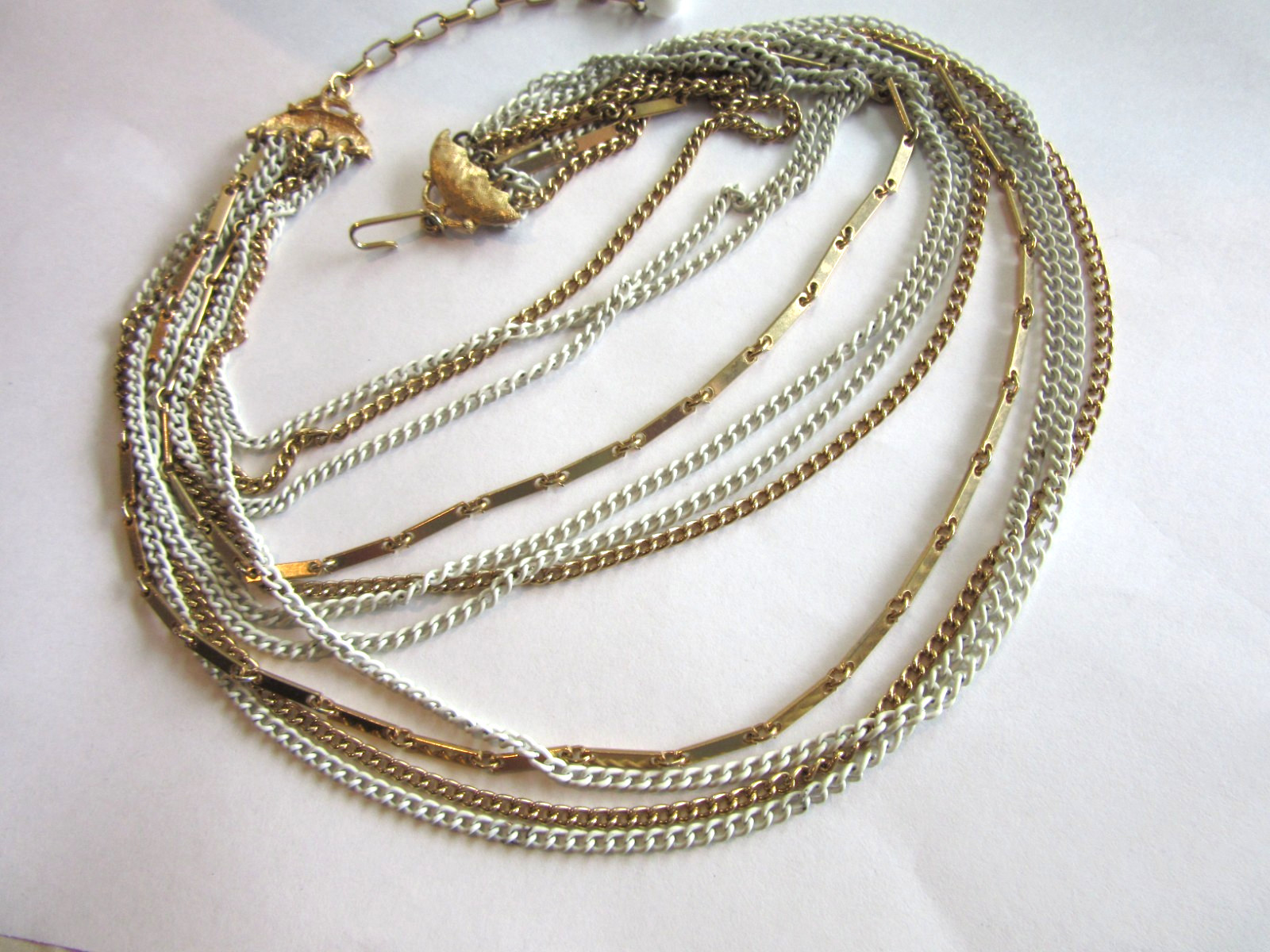 Vintage 10-chain white enameled and gold tone chains necklace -14″ long