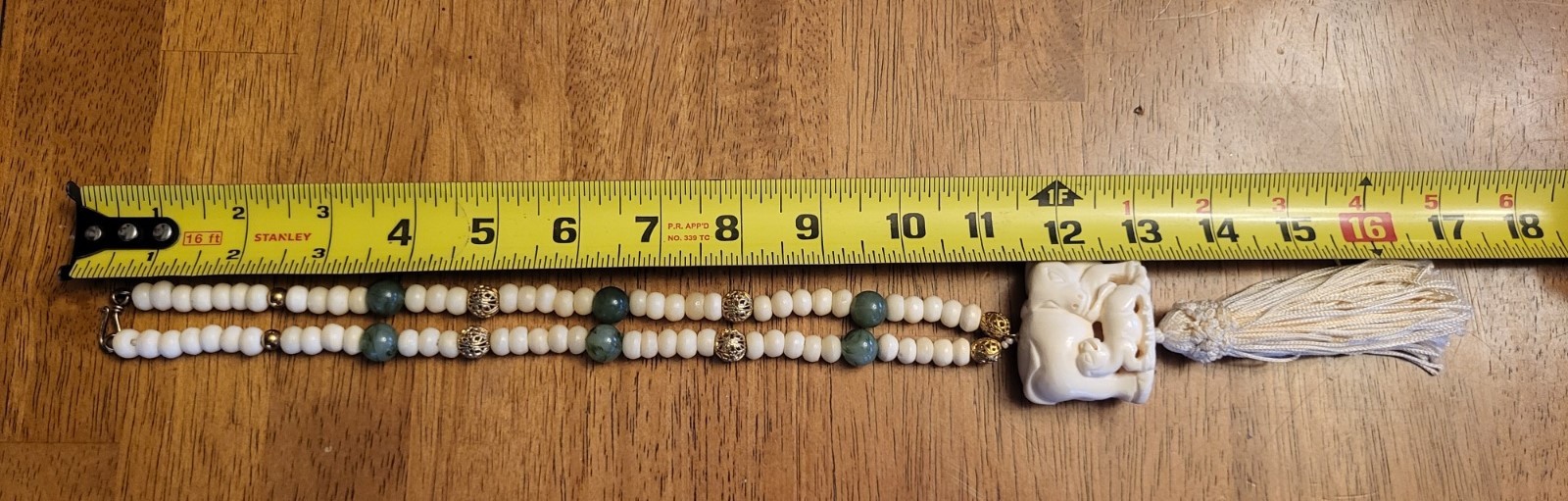 Vintage Ox & Calf Celluloid Netsuke Bead Tassel Necklace 22 Inches 5.5 Inch Drop