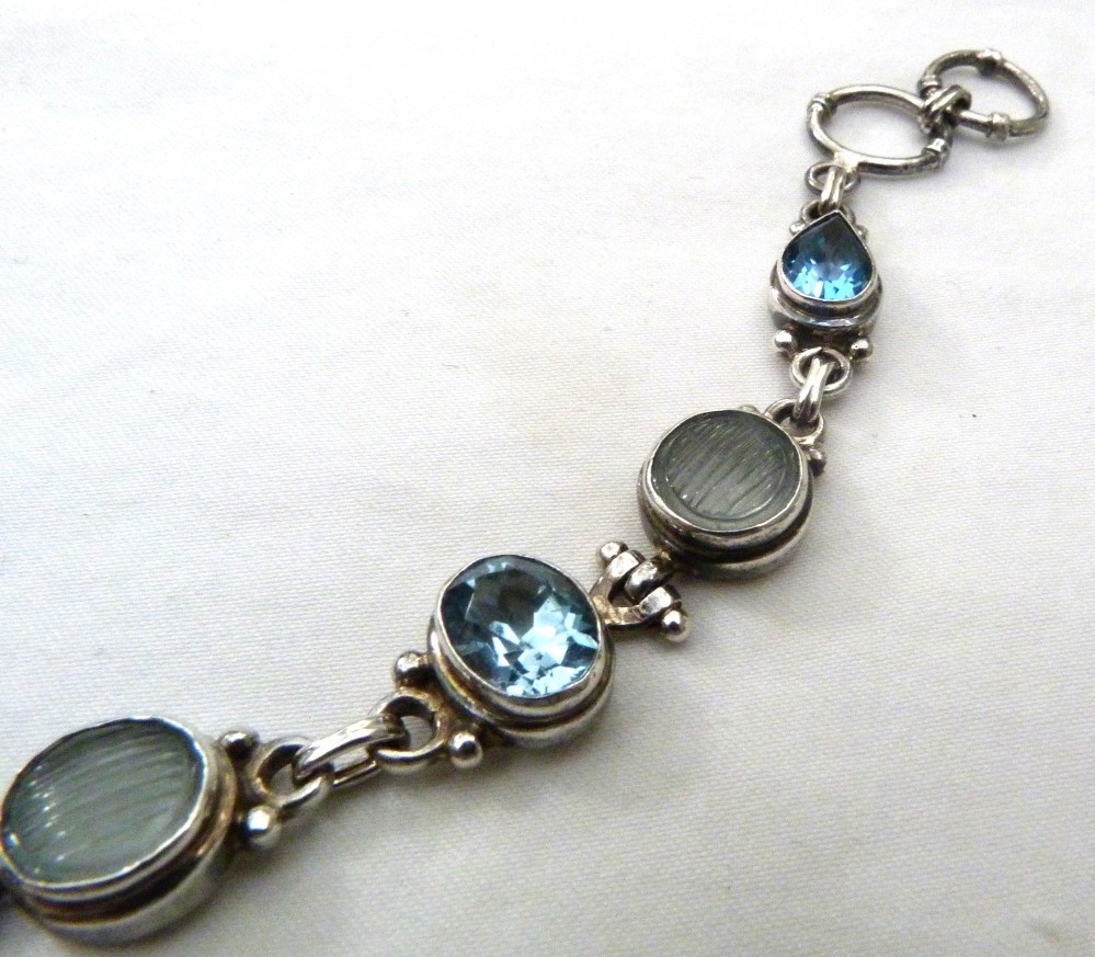 LARGE OVAL FACETED BLUE TOPAZ MELON CARVED QUARTZ STERLING SILVER BRACELET