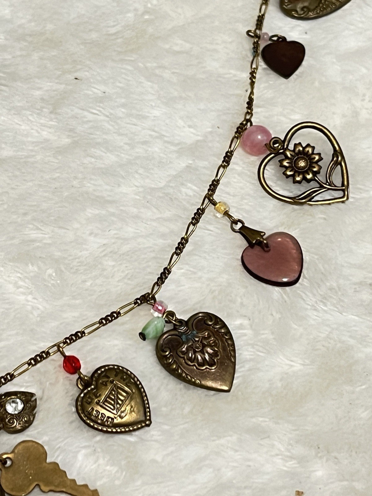 VTG GLASS WORKS STUDIO 19 Charms 29″ Long Bronze Necklace Hearts Lie Detector