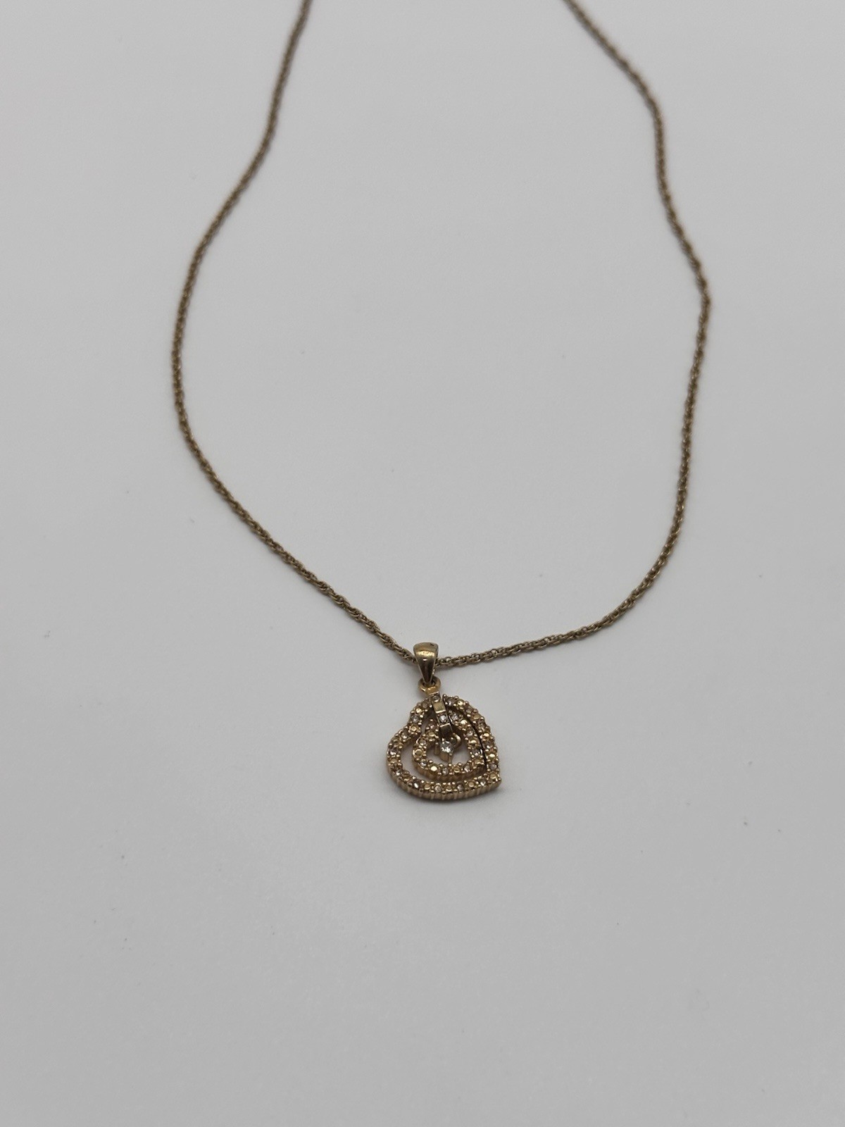 Avon Triple Heart Pendant Gold Tone And CZ Chain Necklace Graduated Open Hearts