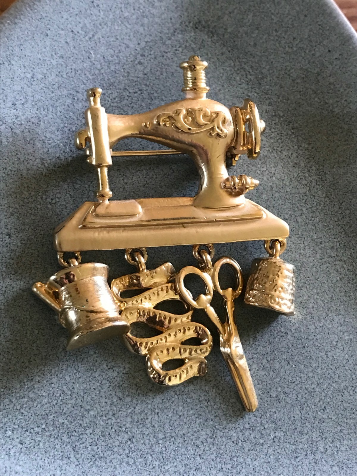 Vintage Danecraft Marked Goldtone Sewing Machine w Scissors Thimble Tape Measure