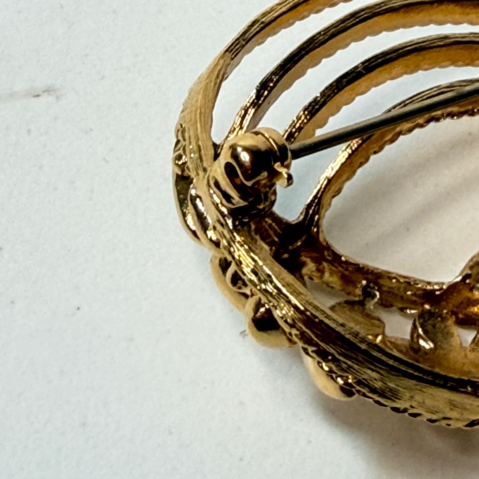 Monet Gold Tone Swirl Ribbon Flower Brooch Vintage Textured Floral Pin