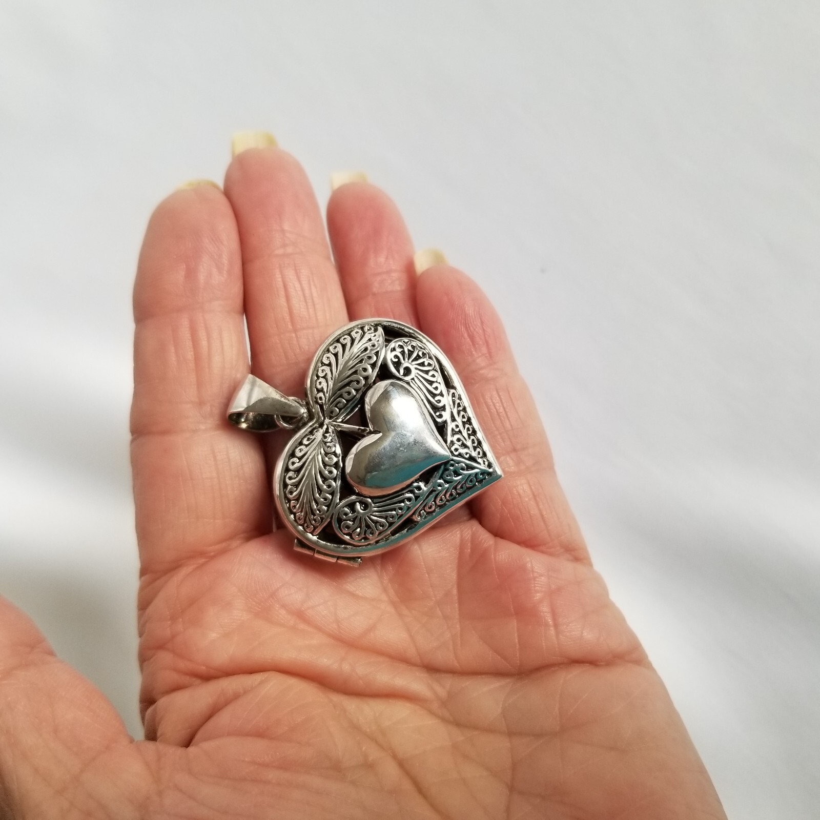 Best Mom heart wings locket puff pendant shiny silver plated filigree