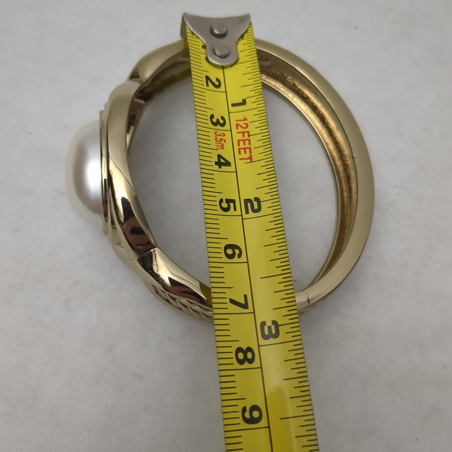 Large Faux Pearl Gold Tone Bracelet 8 1/2″ around, 1 1/4″ wide, 2 1/4″ across